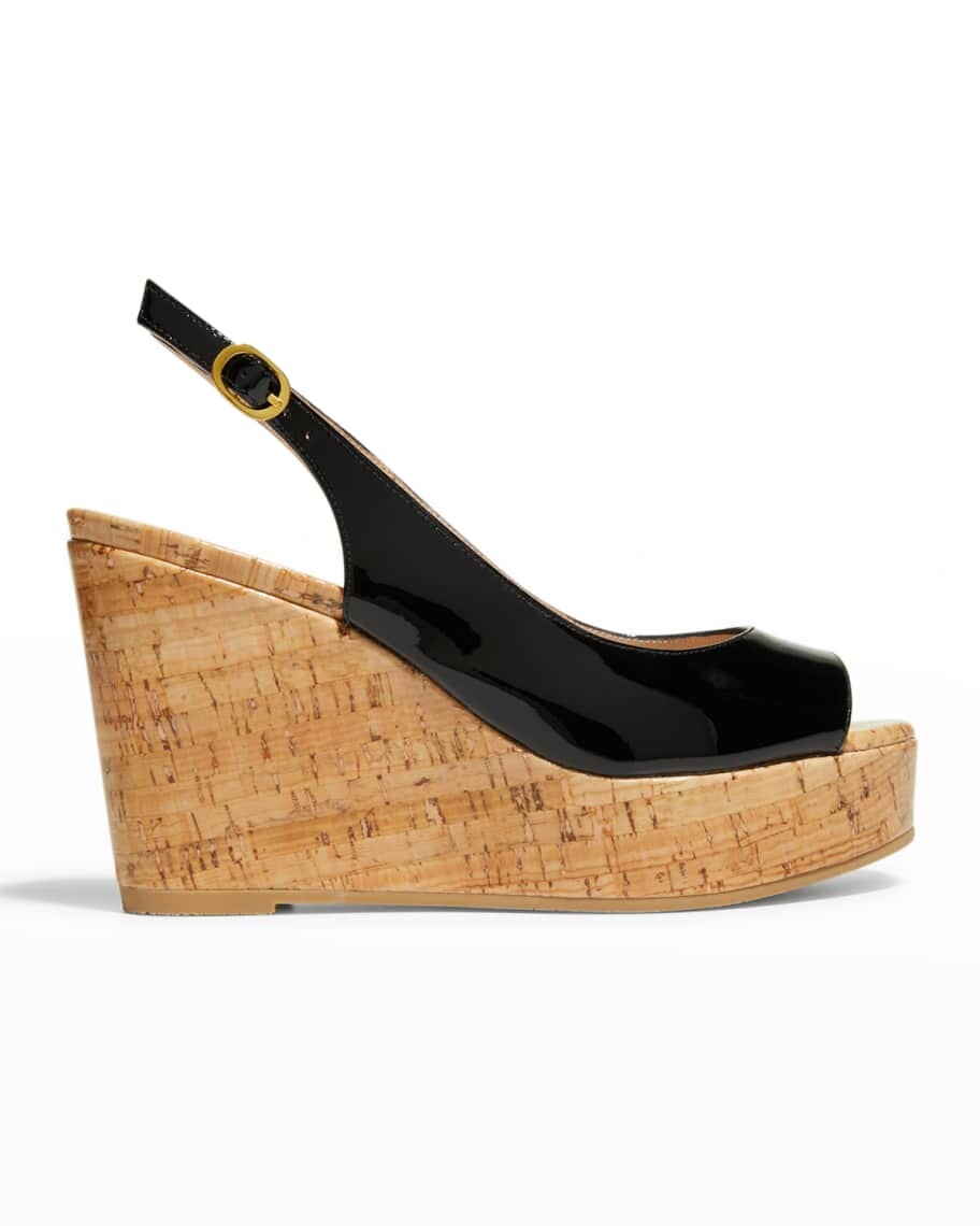 

Босоножки Riveria из лакированной кожи с пробковой танкеткой Stuart Weitzman