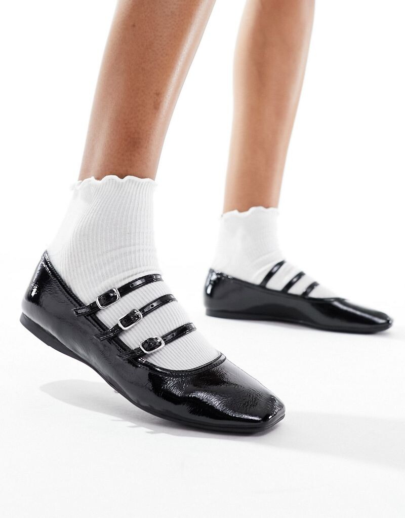 

Schuh Lianna черные лакированные балетки с пряжками