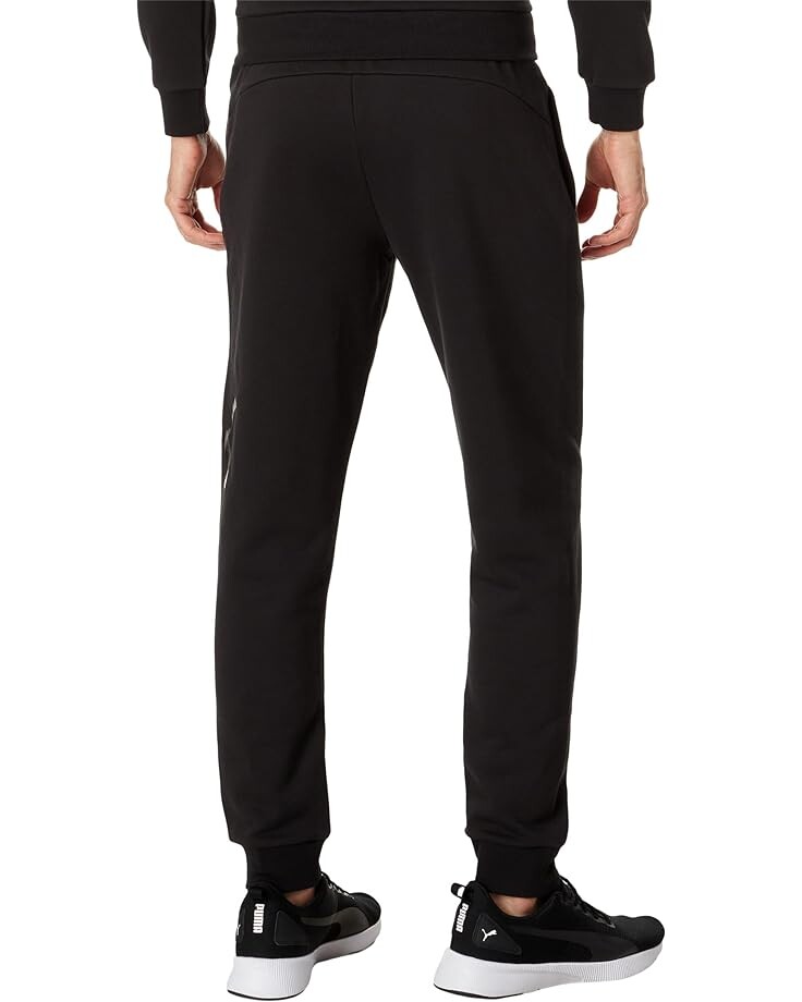 

Брюки PUMA Essentials+ Logo Lab Holiday Sweatpants, цвет Puma Black