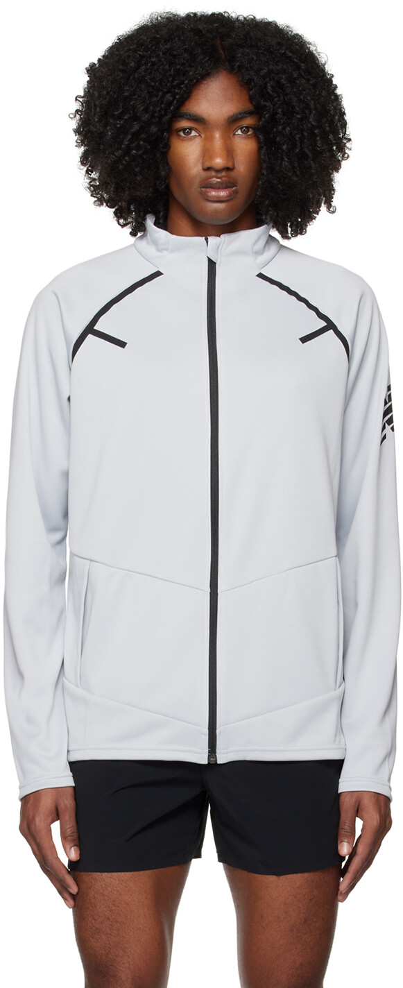 

Серая тренировочная футбольная куртка Tenacity New Balance