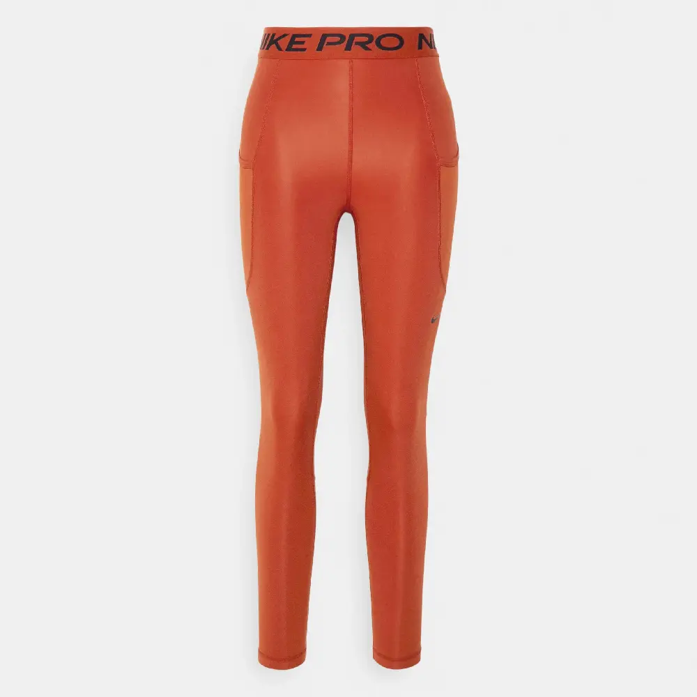 

Спортивные леггинсы Nike Performance, оранжевый