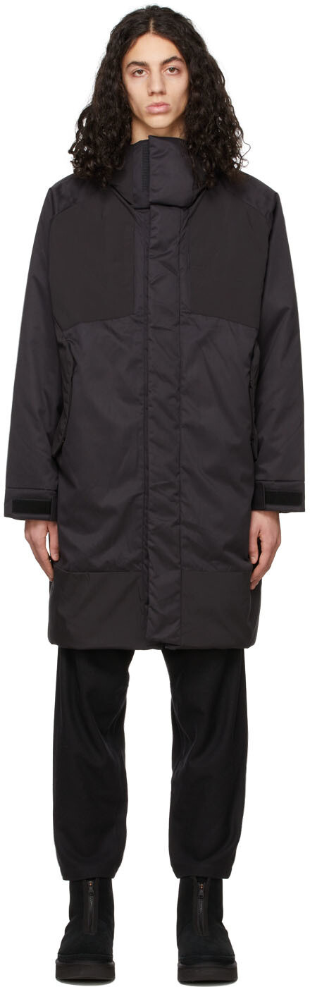 

Черный пуховик Monster Parka White Mountaineering︎