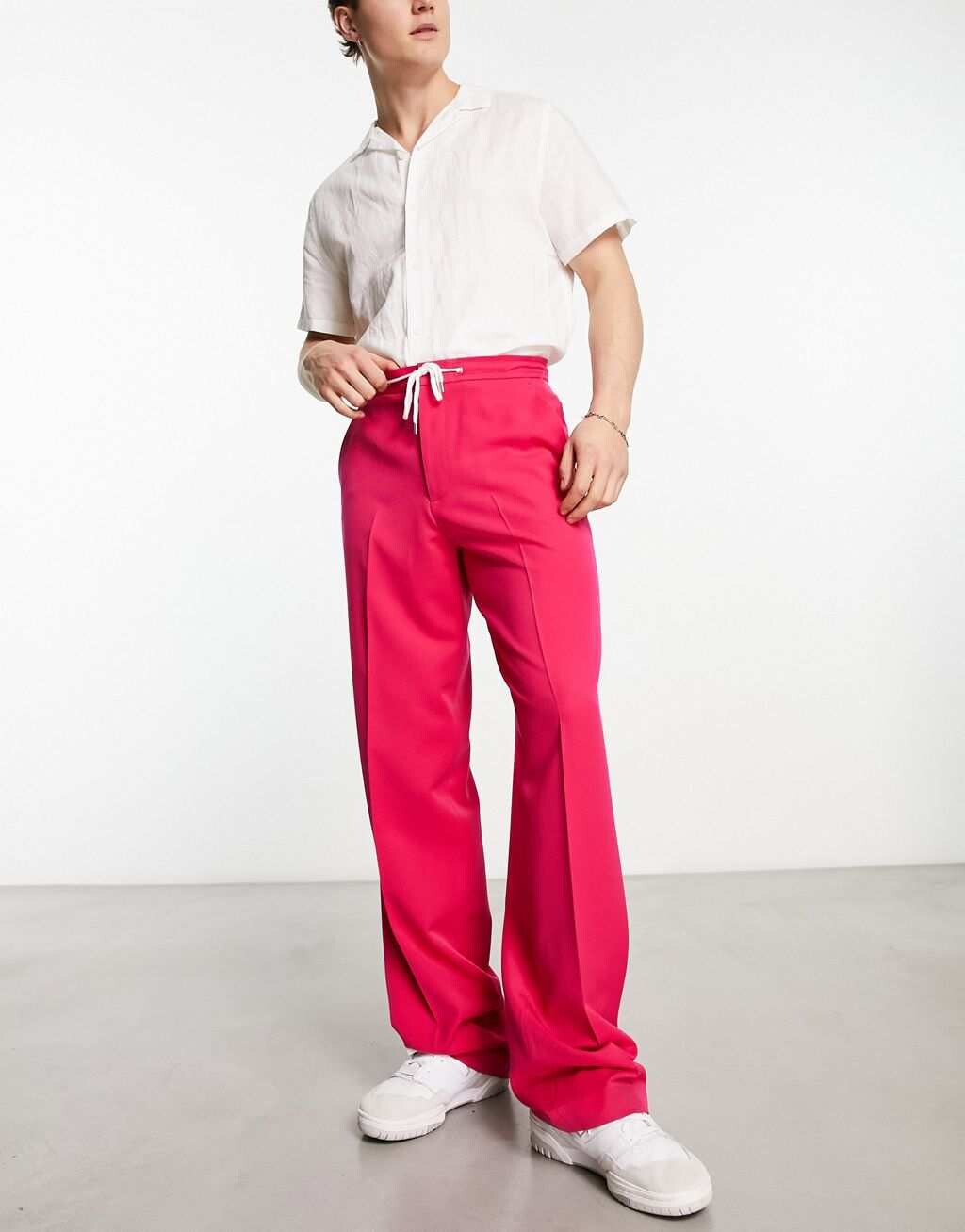 

Розовые широкие брюки с утягивающим шнурком ASOS DESIGN