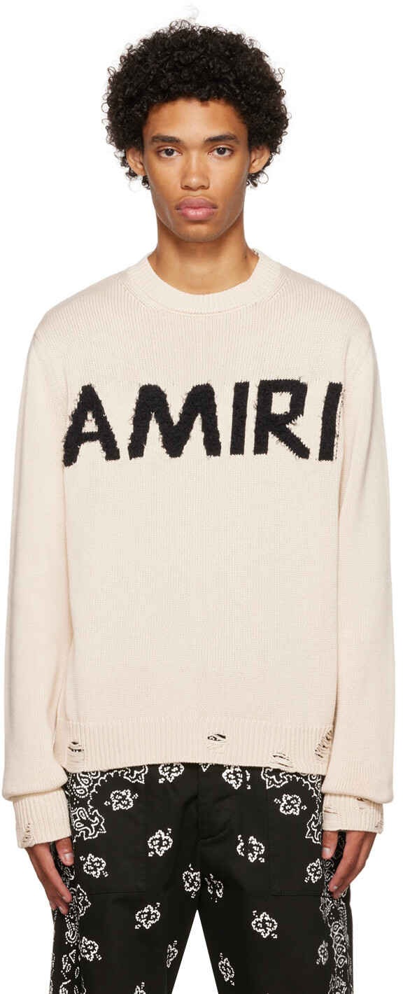 

Бежевый свитер с ресничками AMIRI