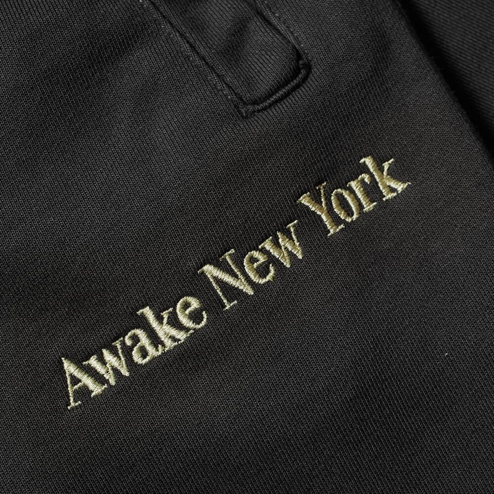 

Окрашенные пигментом спортивные брюки с вышивкой Awake NY
