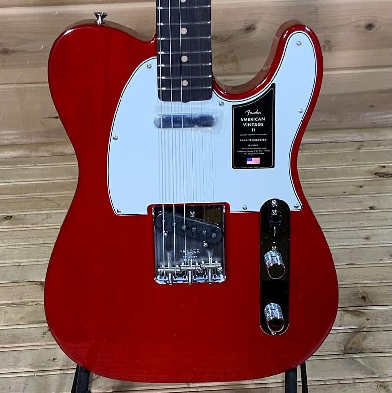 

Электрогитара Fender American Vintage II 1963 Telecaster - темно-красная прозрачная American Vintage II 1963 Telecaster Electric Guitar - Crimson Red Transparent
