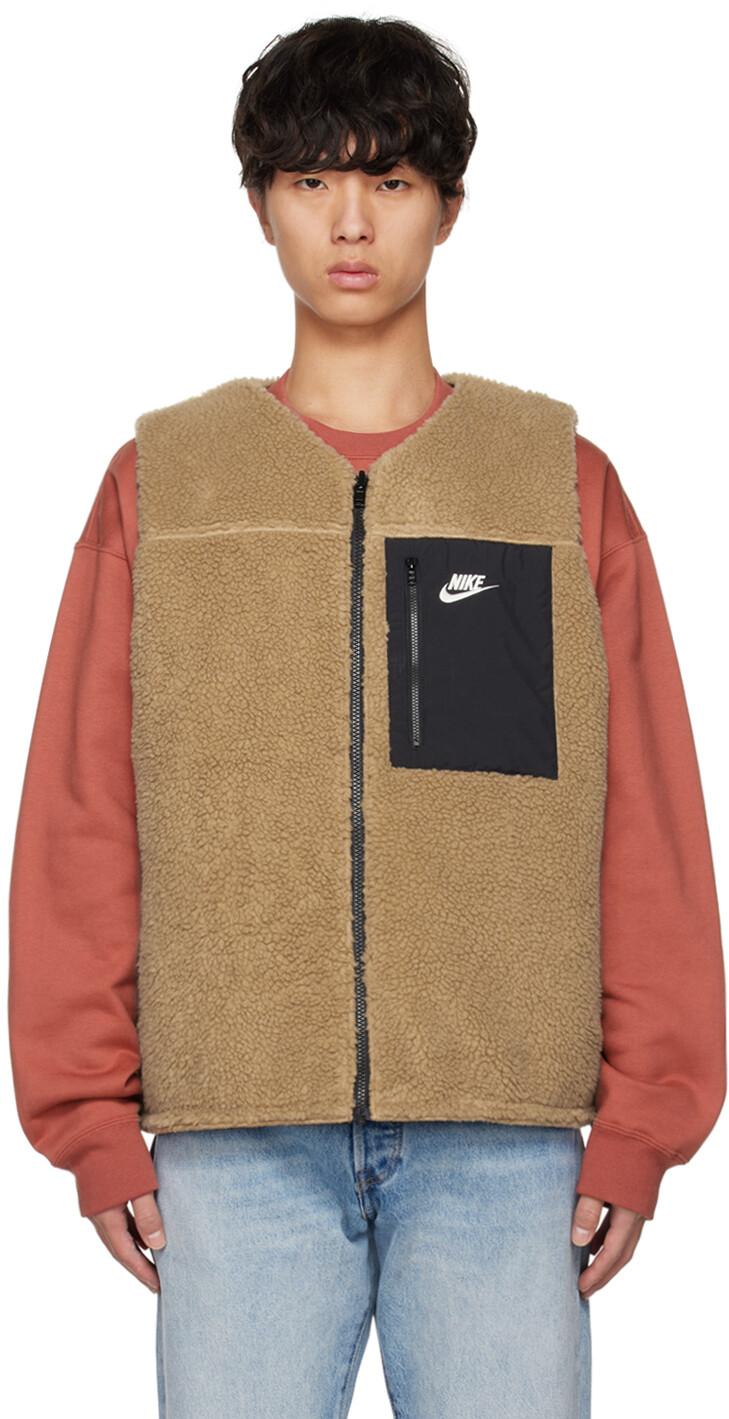 

Черно-бежевый двусторонний зимний жилет Club+ Nike