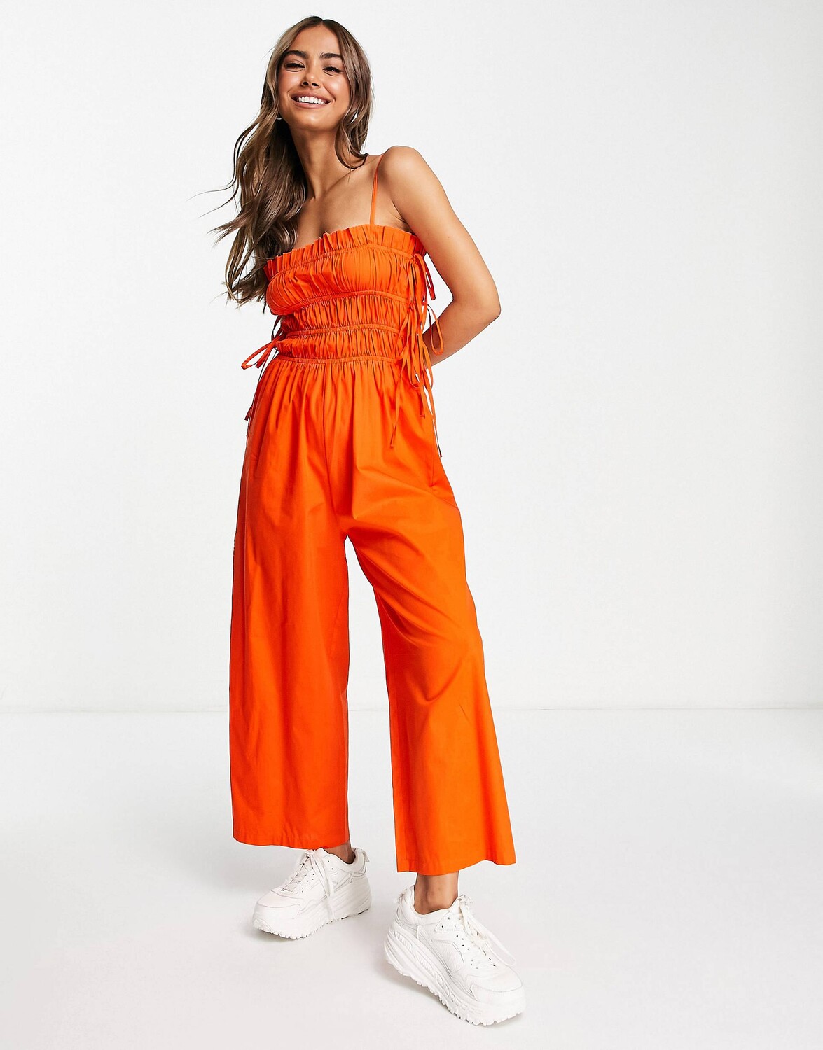 

Красный присборенный комбинезон с завязками сбоку ASOS DESIGN