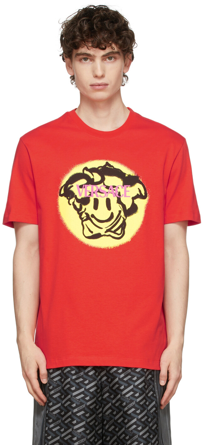 

Оранжевая футболка с надписью Medusa Smile Versace