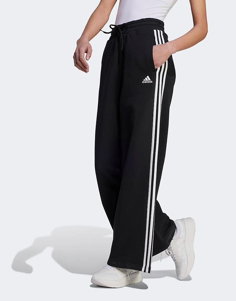 

adidas Essentials – широкие черные джоггеры с тремя полосками