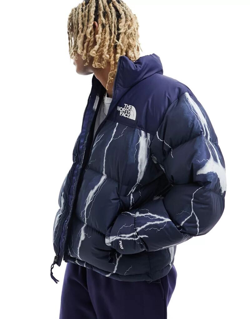

Темно-синяя стеганая куртка The North Face 96 Retro Nuptse с принтом молний