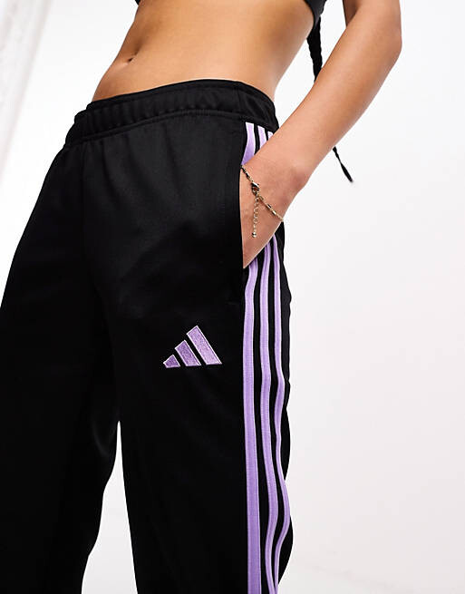 

Черные и фиолетовые джоггеры adidas Football Tiro 23