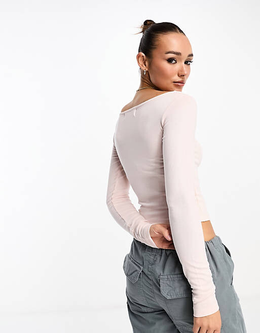 

Розовый топ с разрезом на воротнике Stradivarius STR