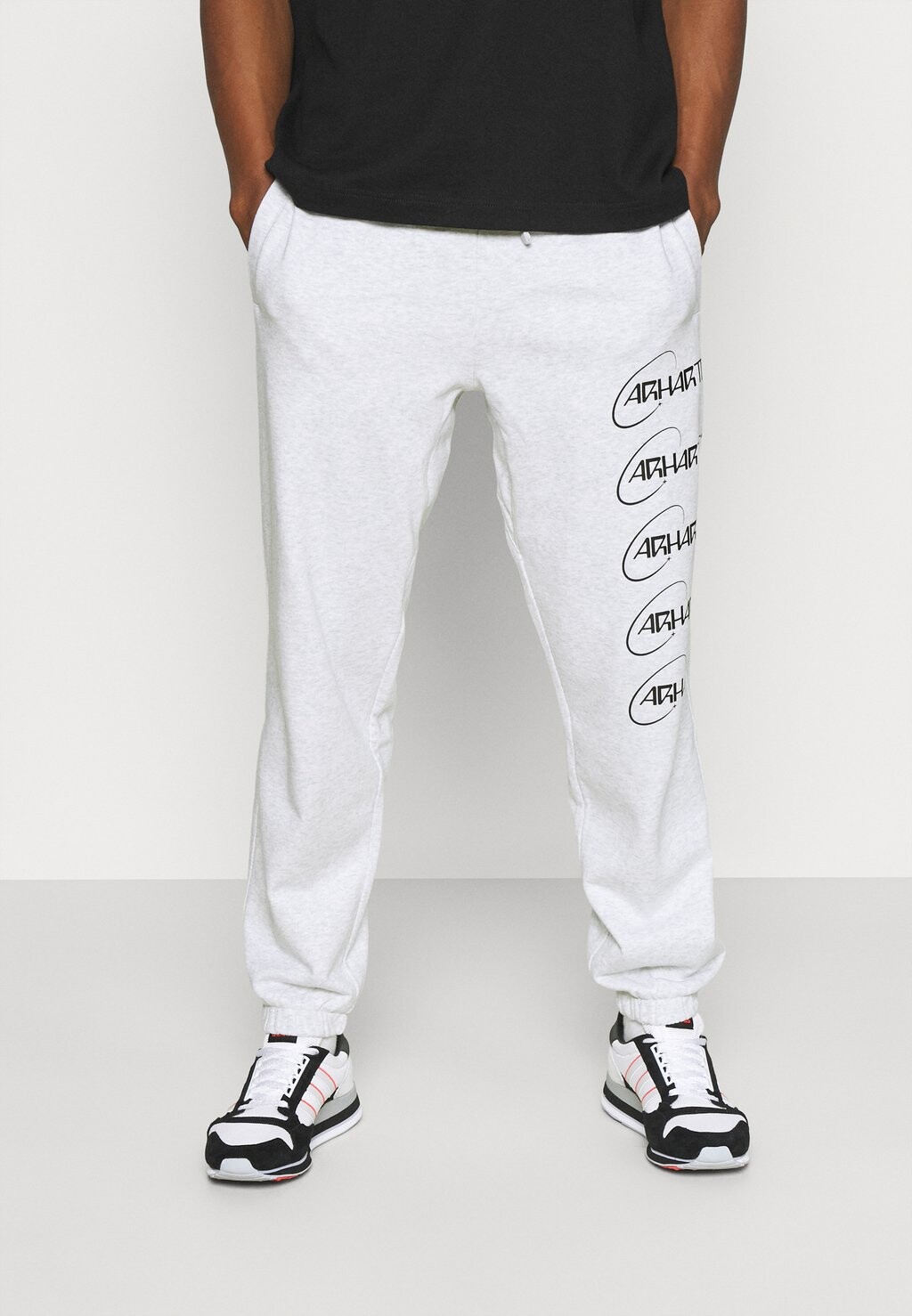 

Тренировочные брюки Carhartt WIP, серый меланж