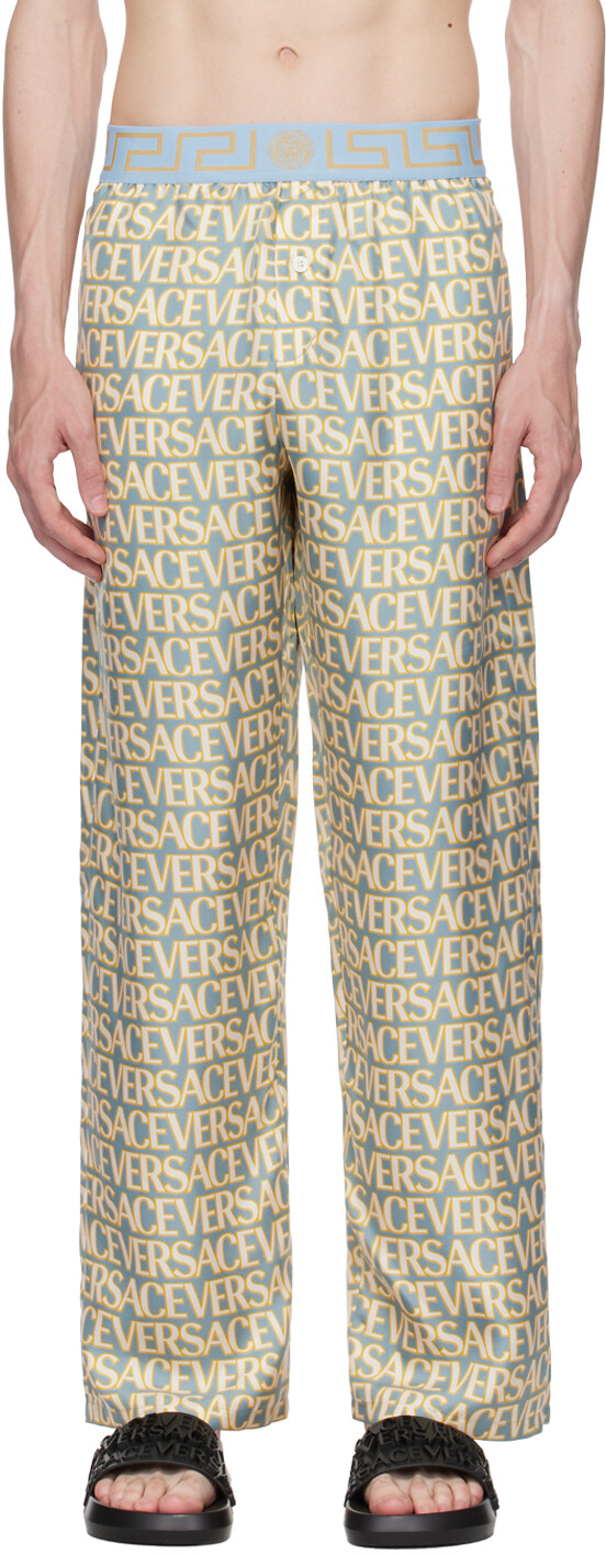 

Синие и кремово-белые пижамные брюки по всей длине Versace Underwear