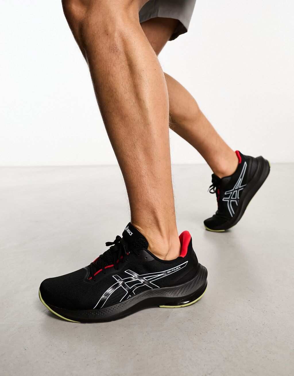 

Черные и красные кроссовки для бега Asics Gel-Pulse 14