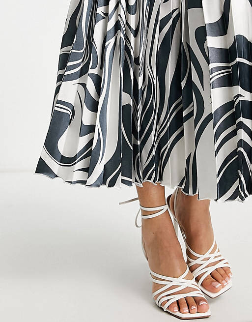 

Атласная плиссированная юбка миди ASOS DESIGN Petite с однотонным зебровым принтом