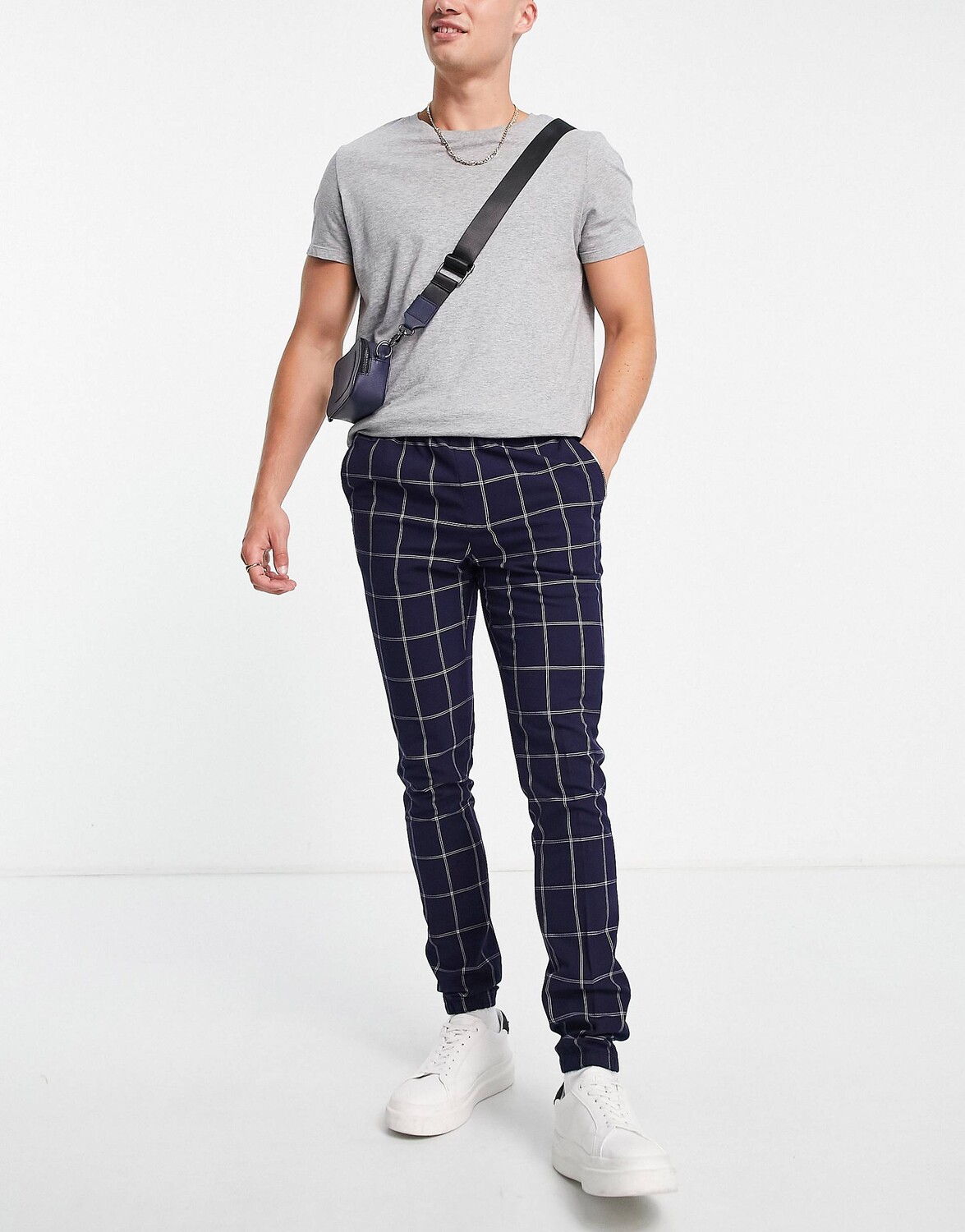 

Темно-синие джоггеры скинни в клетку с окошком ASOS DESIGN