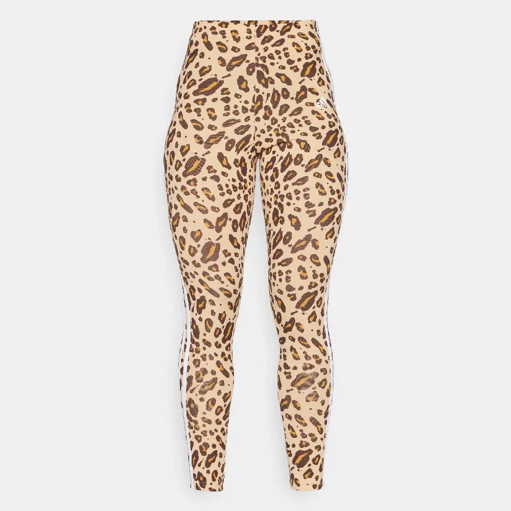

Леггинсы Adidas Sportswear Essentials Animal Print, бежевый
