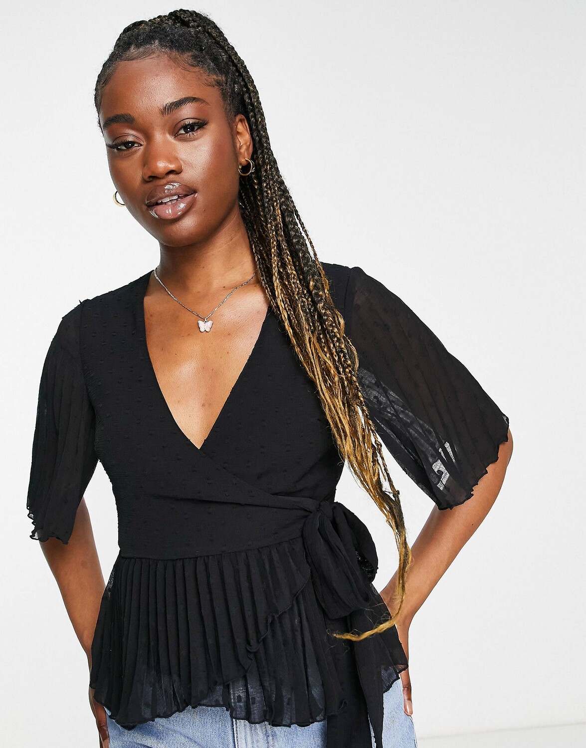 

Черная блузка с короткими рукавами и плиссированной баской ASOS DESIGN