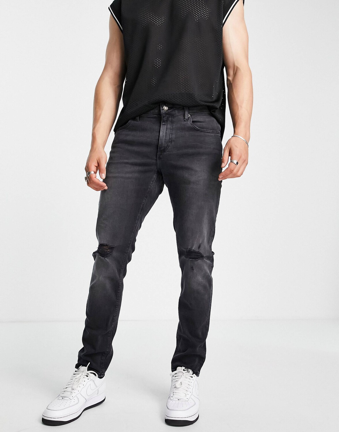 

Черные джинсы скинни стрейч с прорезями на коленях ASOS DESIGN