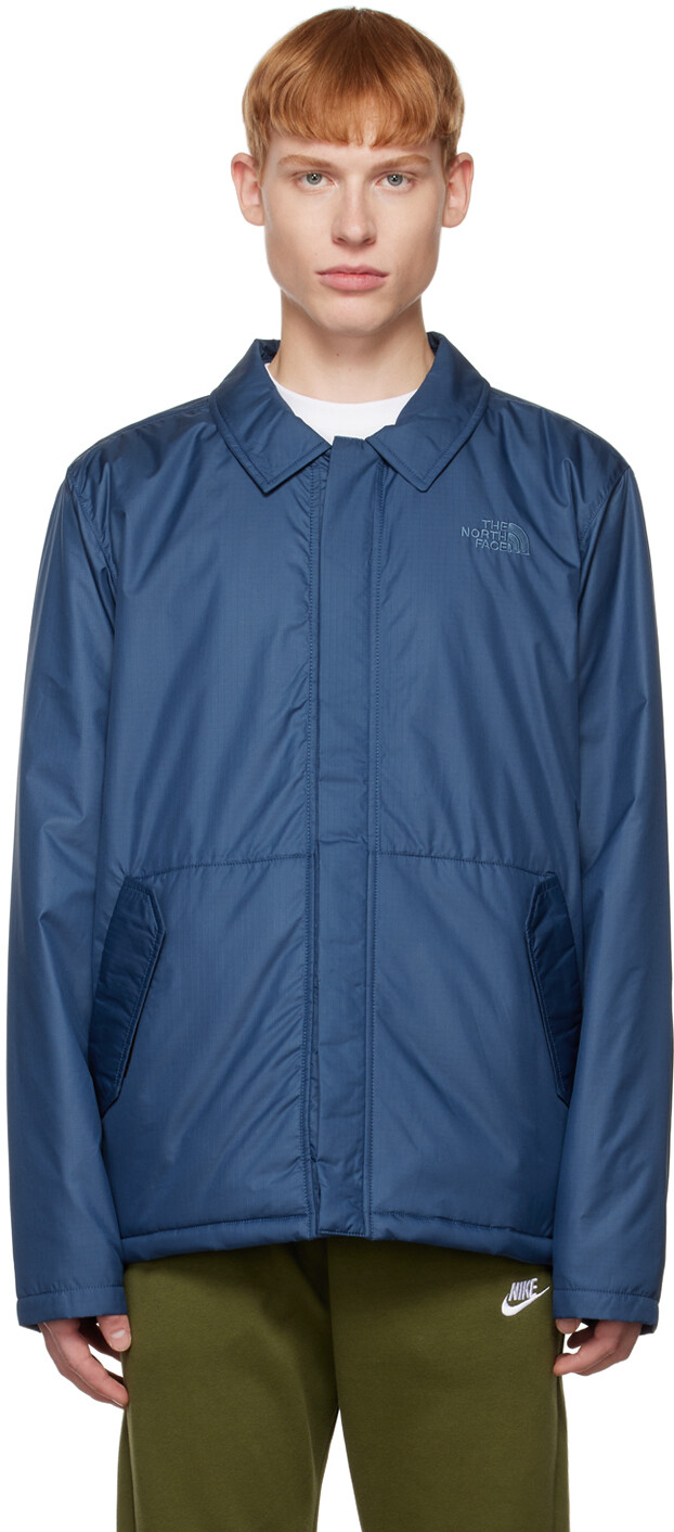 

Синяя утепленная куртка The North Face