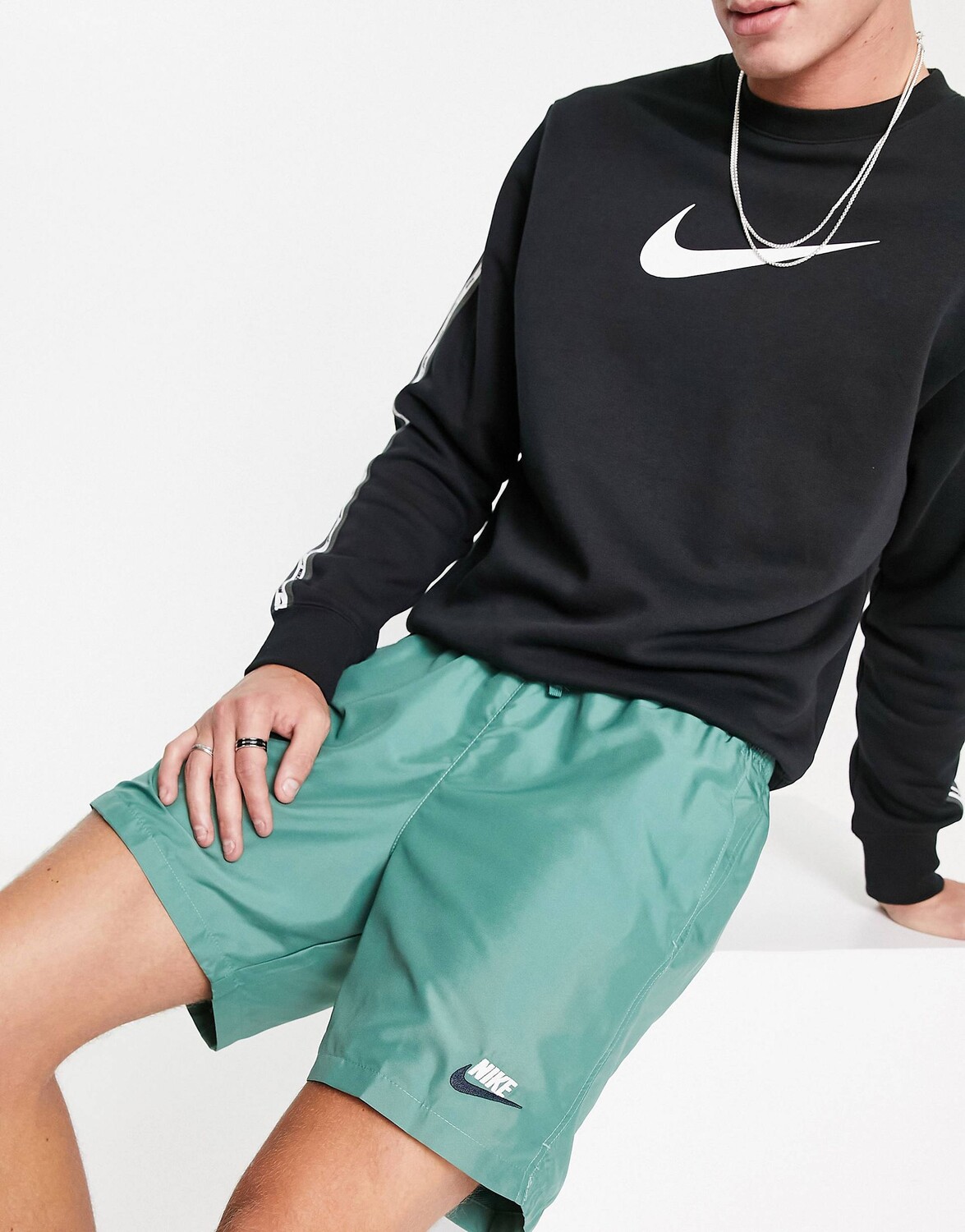 

Синие тканые шорты Nike Club