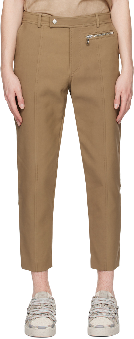 цена Серо-коричневые брюки со вставками Balmain