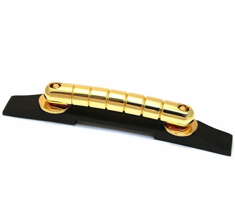 

006-2845-000 Подлинный мостик Gretsch Gold Rocking Bar с основанием из черного дерева 006-2845-000 Genuine Gretsch Gold Rocking Bar Bridge & Ebony Wood Base