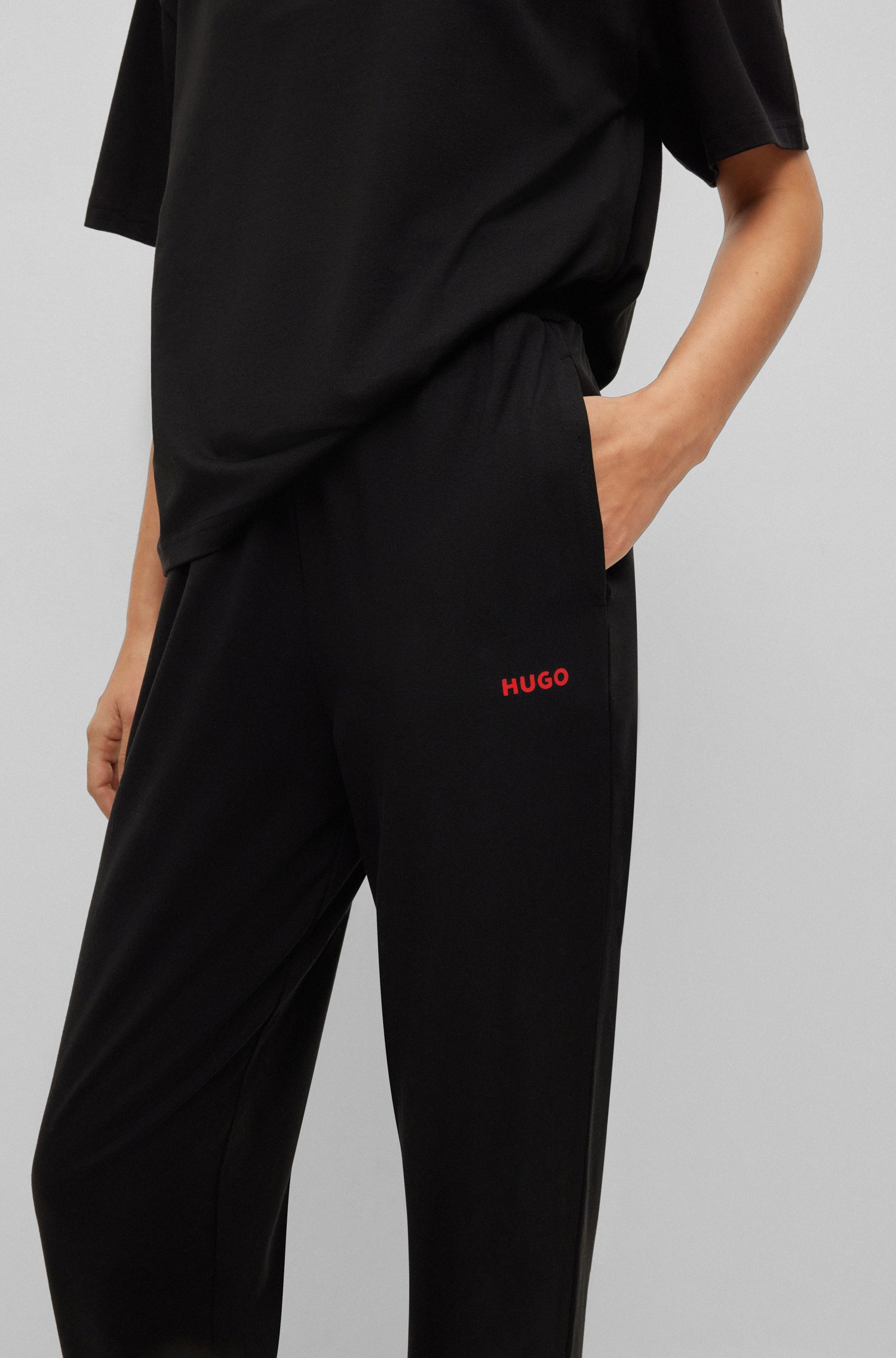 Puma clean Tracksuit bottoms in Black