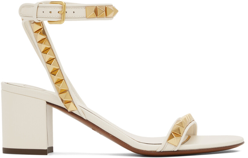 

Босоножки Off-White Rockstud на каблуке Valentino Garavani