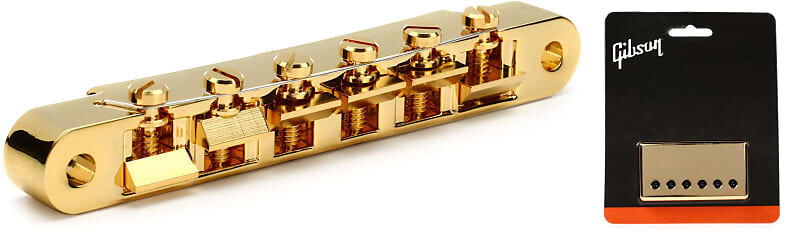 

Аксессуары Gibson ABR-1 Tune-O-Matic Bridge с полной сборкой - золотой комплект с аксессуарами Gibson Neck Position Humbucker Cover - Gold Gibson Accessories PBBR-020=1 PRPC-020=1