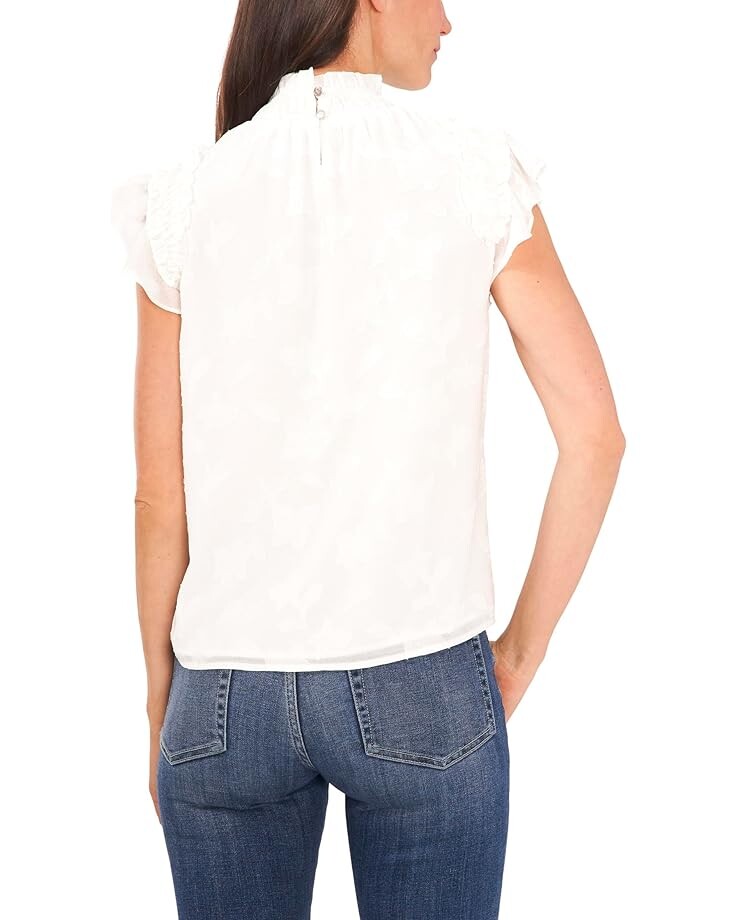 

Блуза CeCe Flutter Sleeve Mock Neck Blouse, цвет Soft Ecru