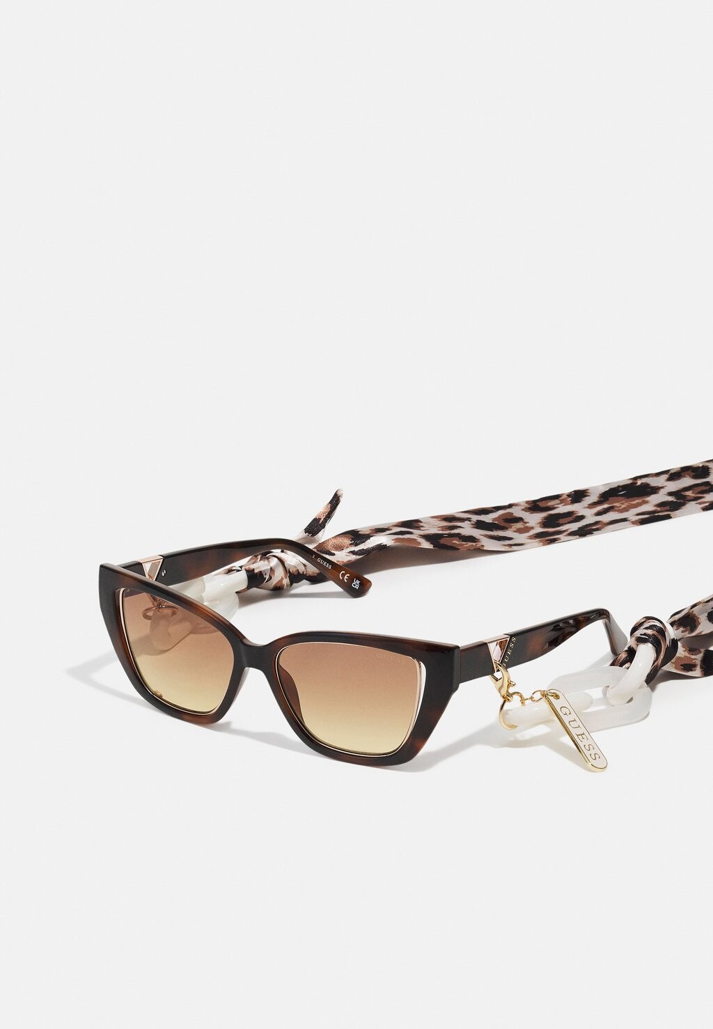 

Солнцезащитные очки Guess, коричневый