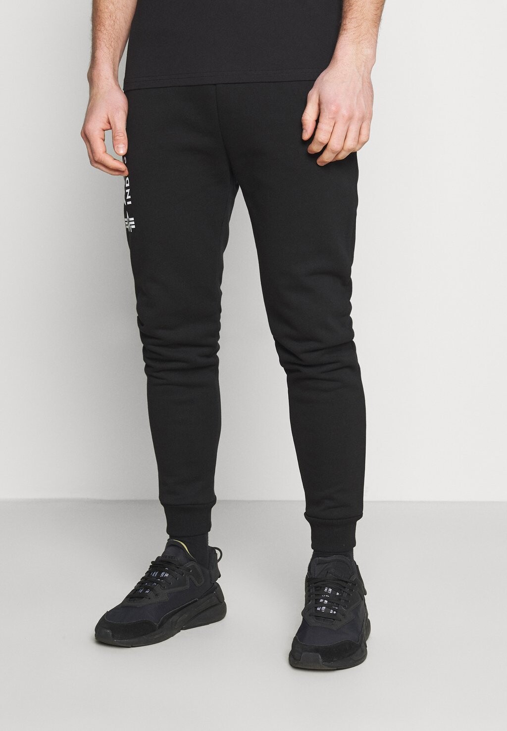 

Тренировочные брюки Alpha Industries, черный