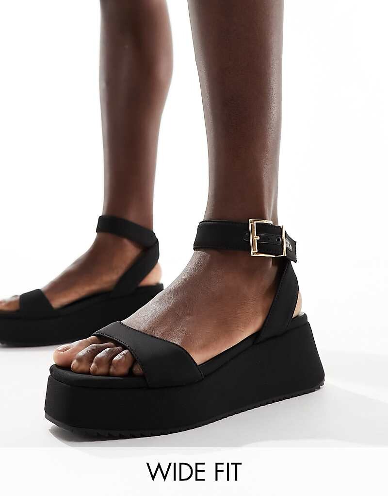 

Черные сандалии ASOS DESIGN – Tantoo – на плоской платформе, широкого кроя