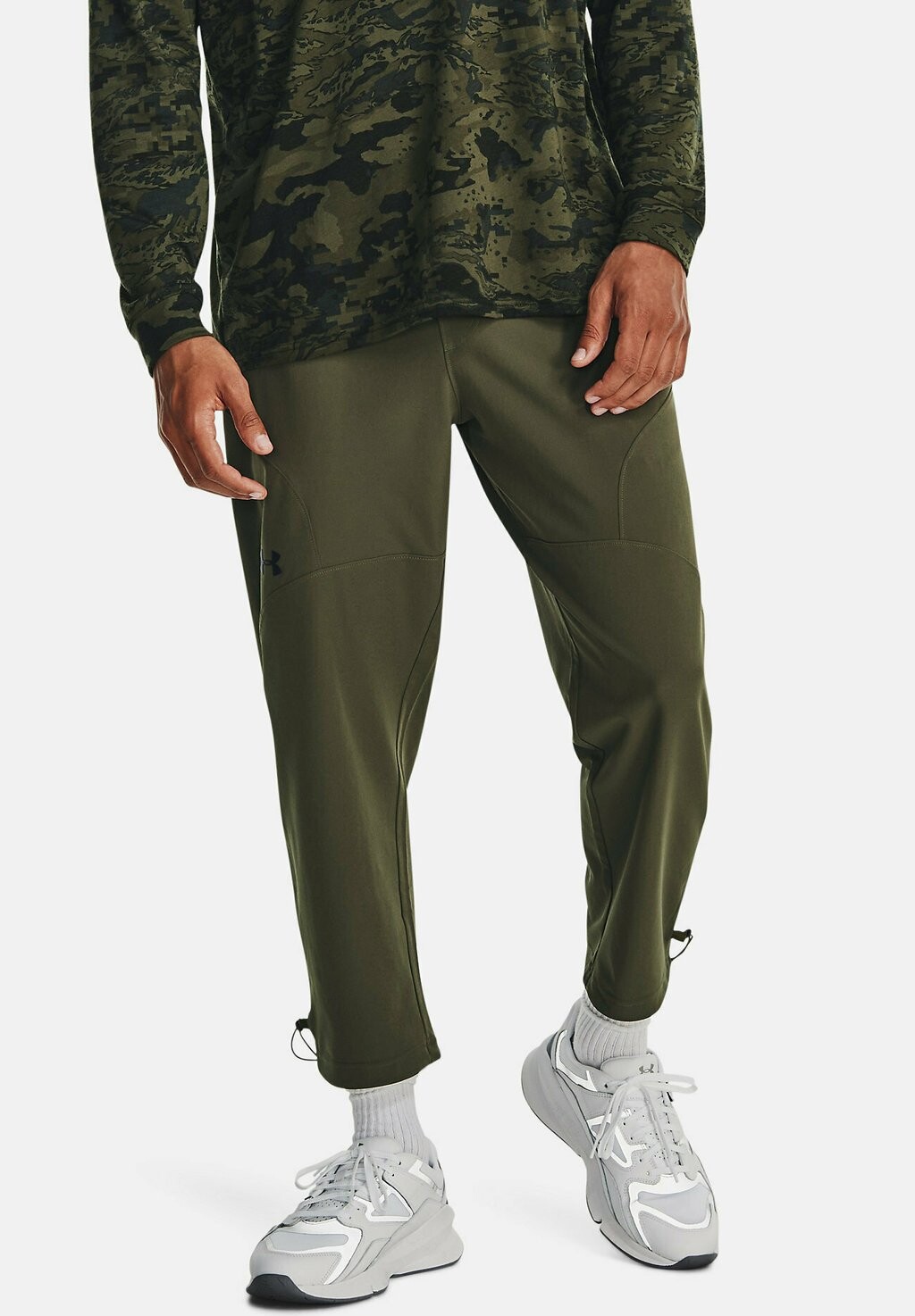 

Спортивные брюки UNSTOPPABLE CROP Under Armour, темно-синие или зеленые