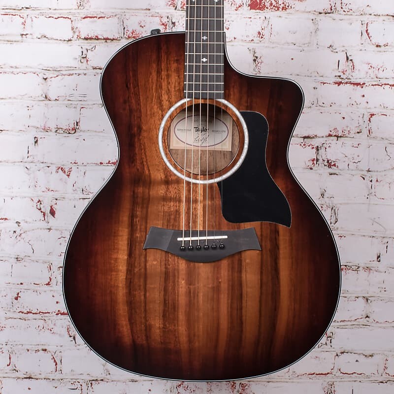 

Taylor 224ce-K - Акустическая/электрическая гитара Deluxe Koa - Shaded Edgeburst Taylor 224ce-K Deluxe Koa /Electric Guitar