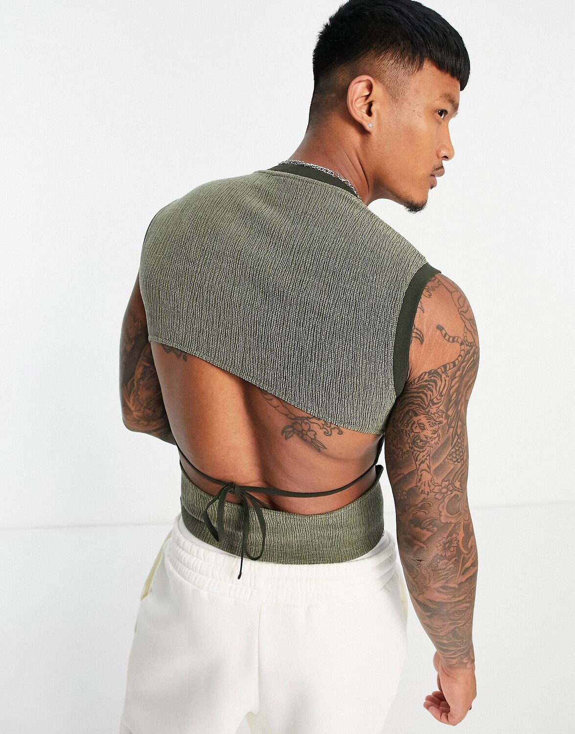 

Зеленый облегающий жилет с вырезом на спине и завязками ASOS DESIGN