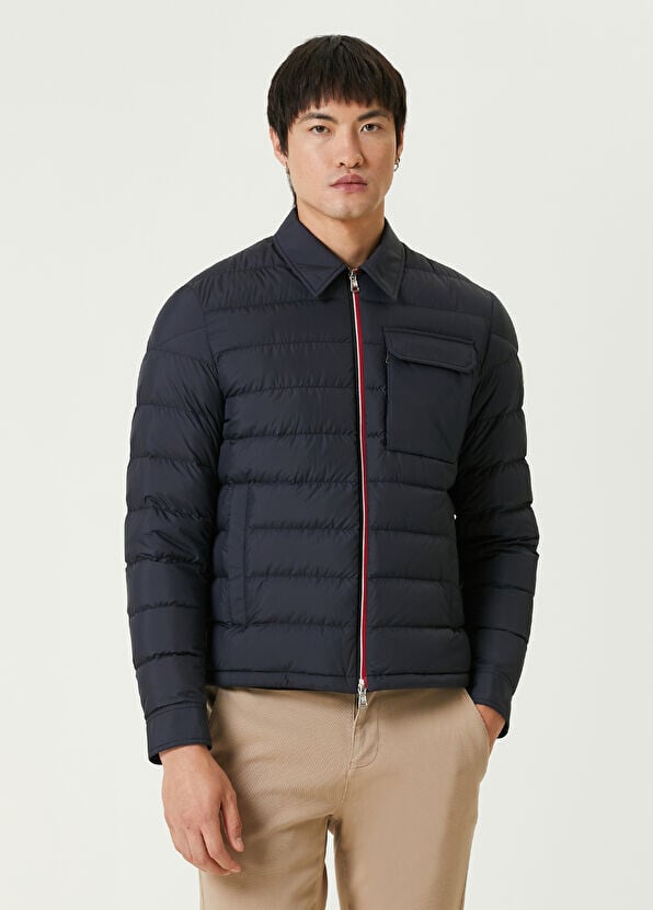 

Пуховое пальто Moncler, синий