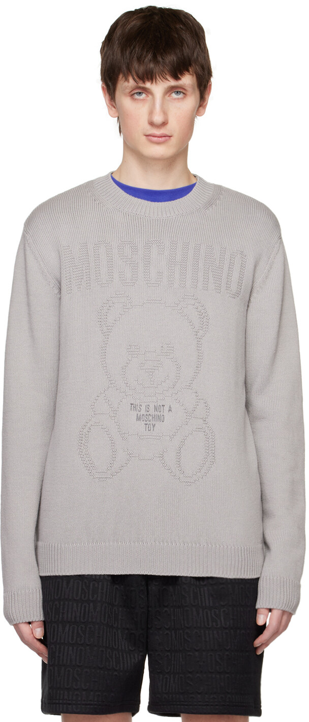 

Серый свитер This Is Not A Moschino Toy
