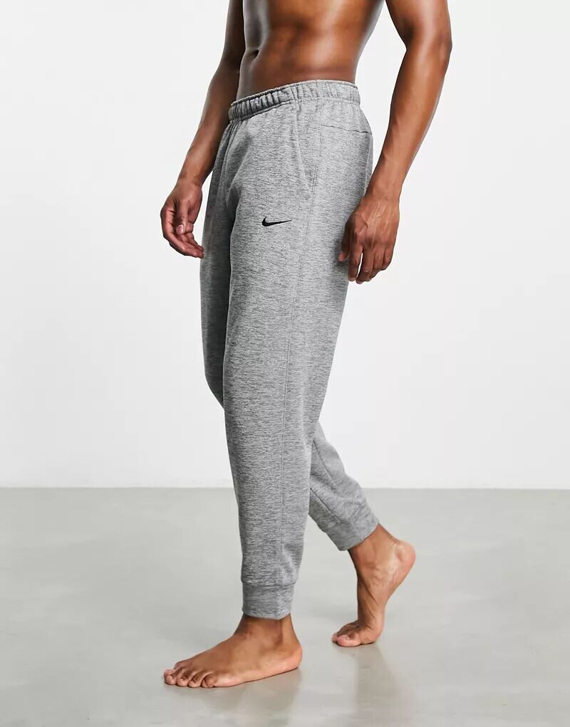 

Серые зауженные джоггеры Nike Dri-FIT