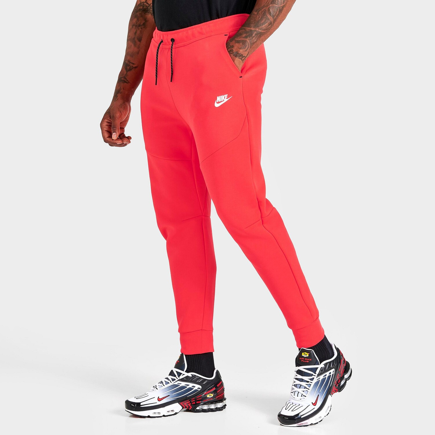 

Брюки-джоггеры Nike Tech Fleece с тесьмой, апельсин