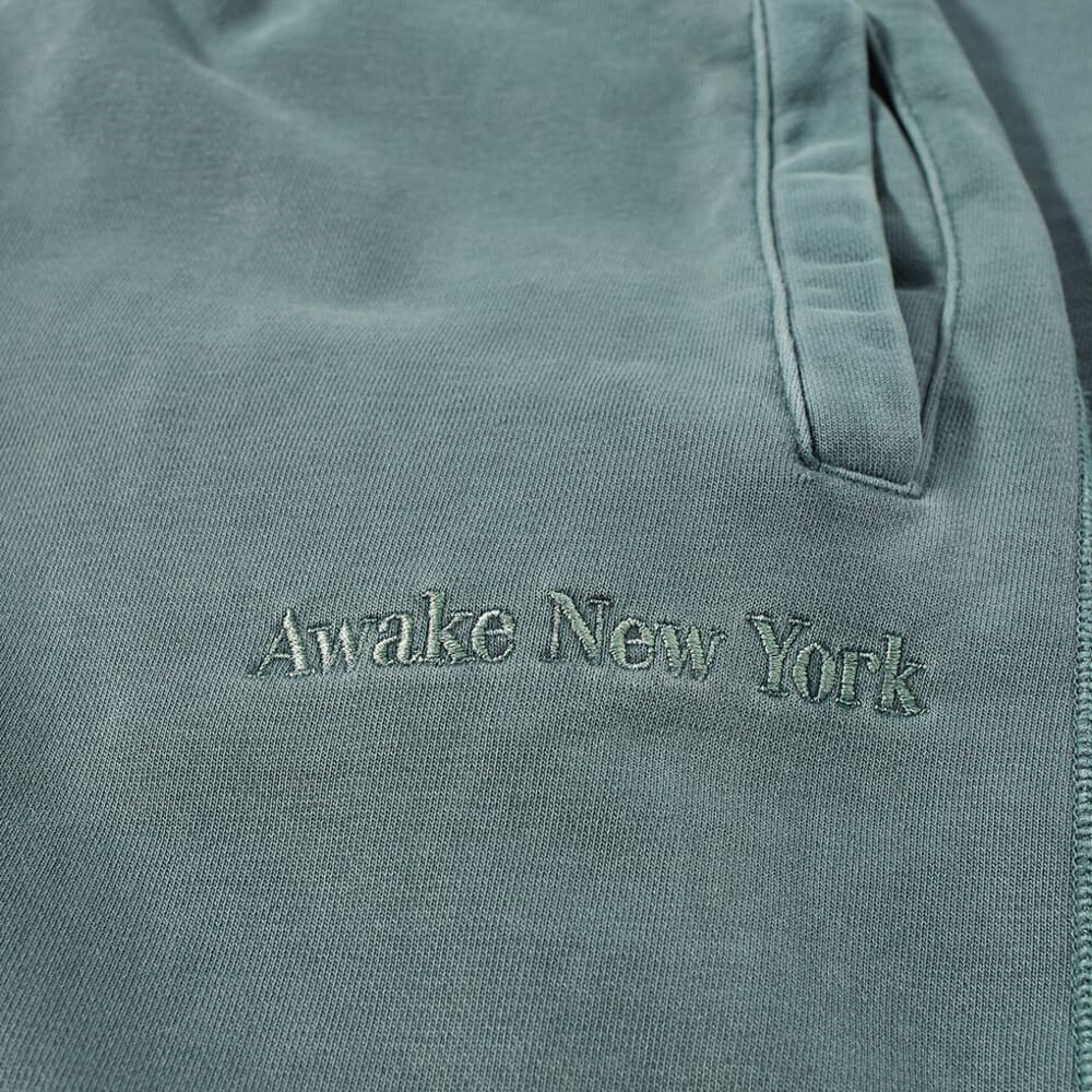 

Окрашенные пигментом спортивные брюки с вышивкой Awake NY