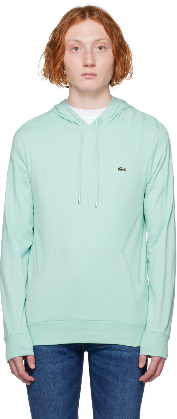 

Худи синего цвета с нашивками Lacoste