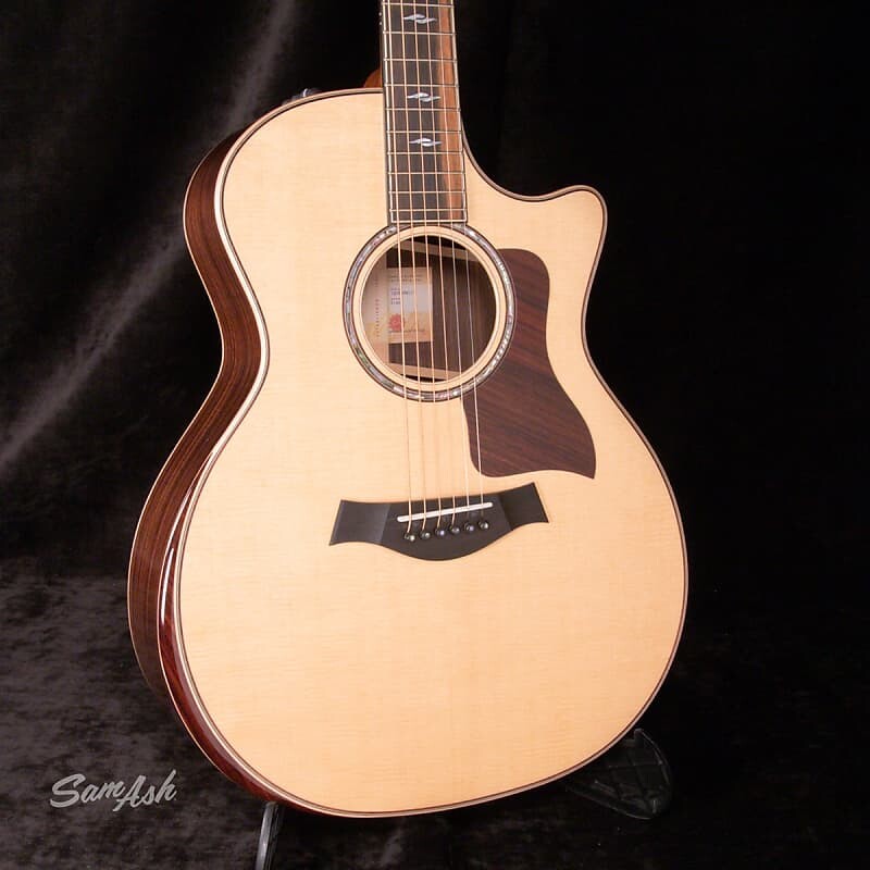 

Taylor 814CE V-КЛАСС АКУСТИЧЕСКАЯ ЭЛЕКТРИЧЕСКАЯ ГИТАРА С ПОДЛОКОТНИКОМ Taylor 814CE V-CLASS ACOUSTIC-ELECTRIC GUITAR WITH ARMREST
