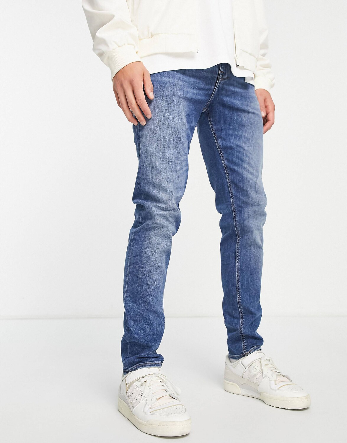 

Джинсы скинни средней потертости ASOS DESIGN, синий