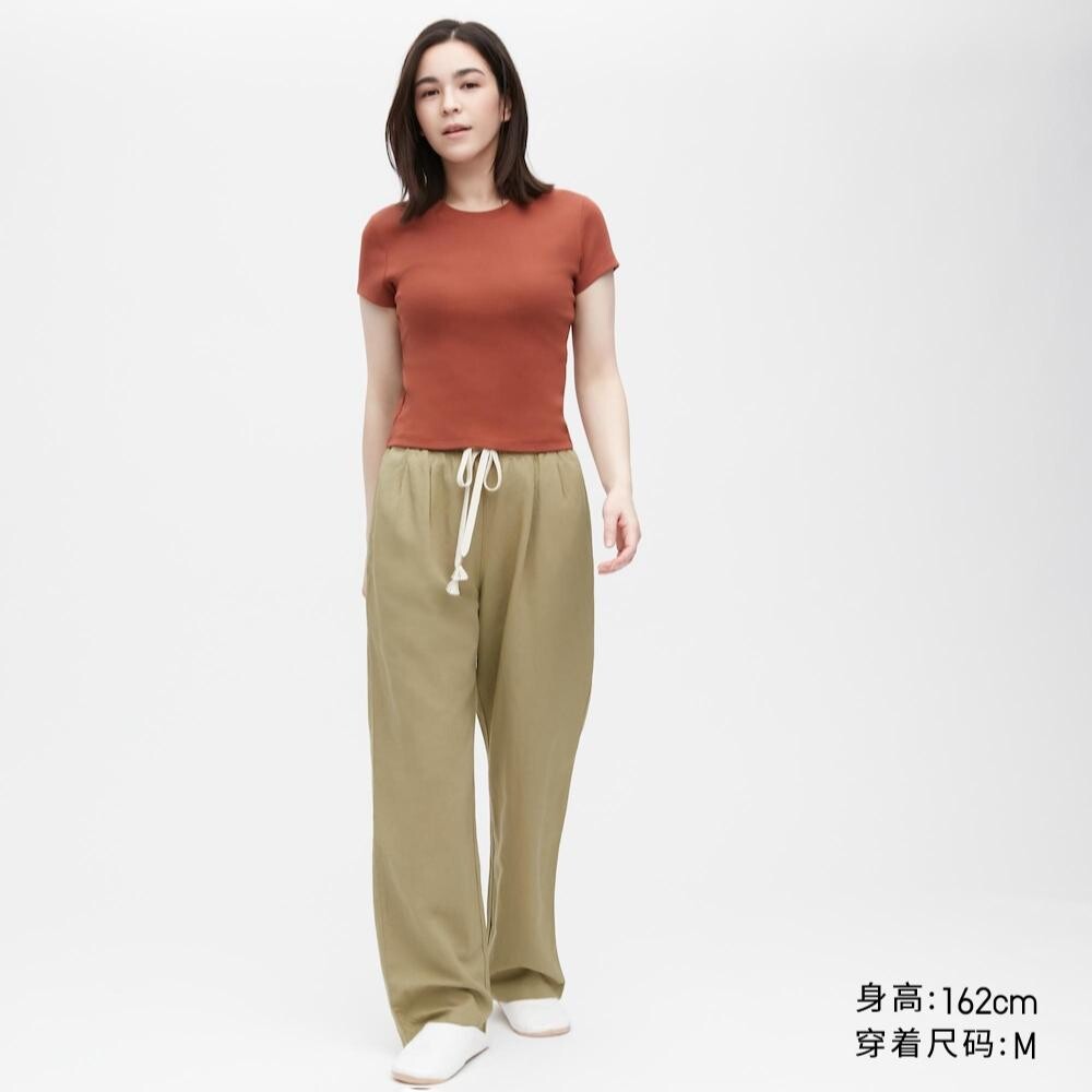 

Эластичные брюки Uniqlo, зеленый