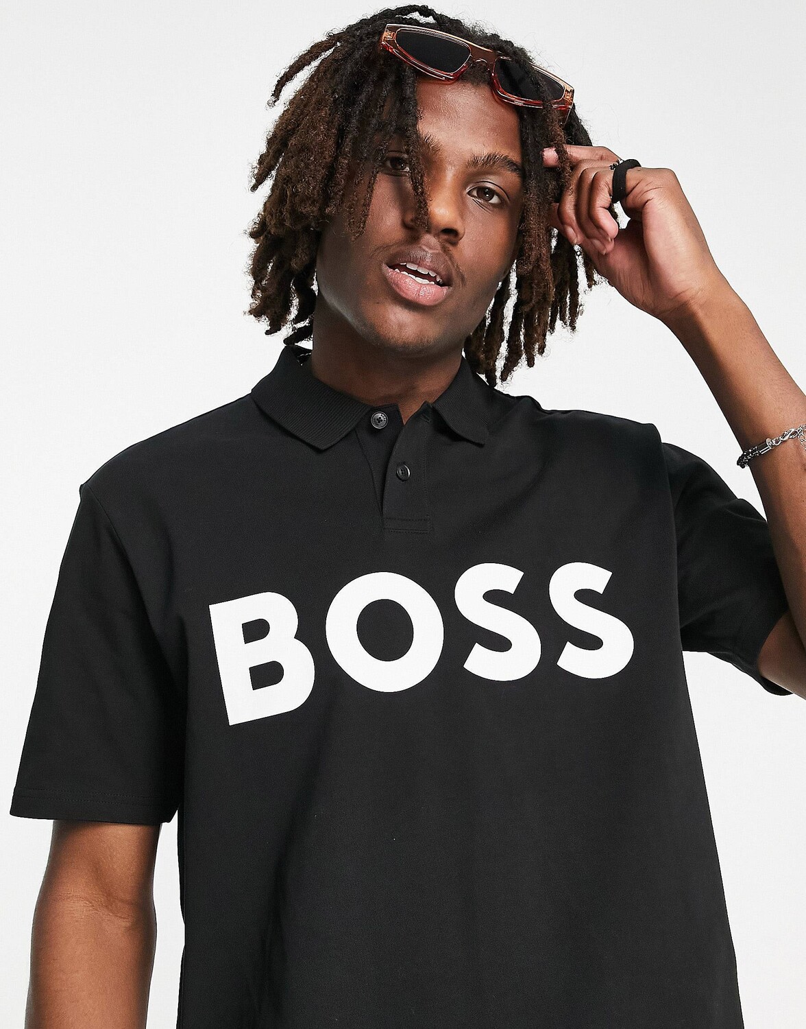 

Черное поло с короткими рукавами и крупным логотипом BOSS Casual PeBigLogo