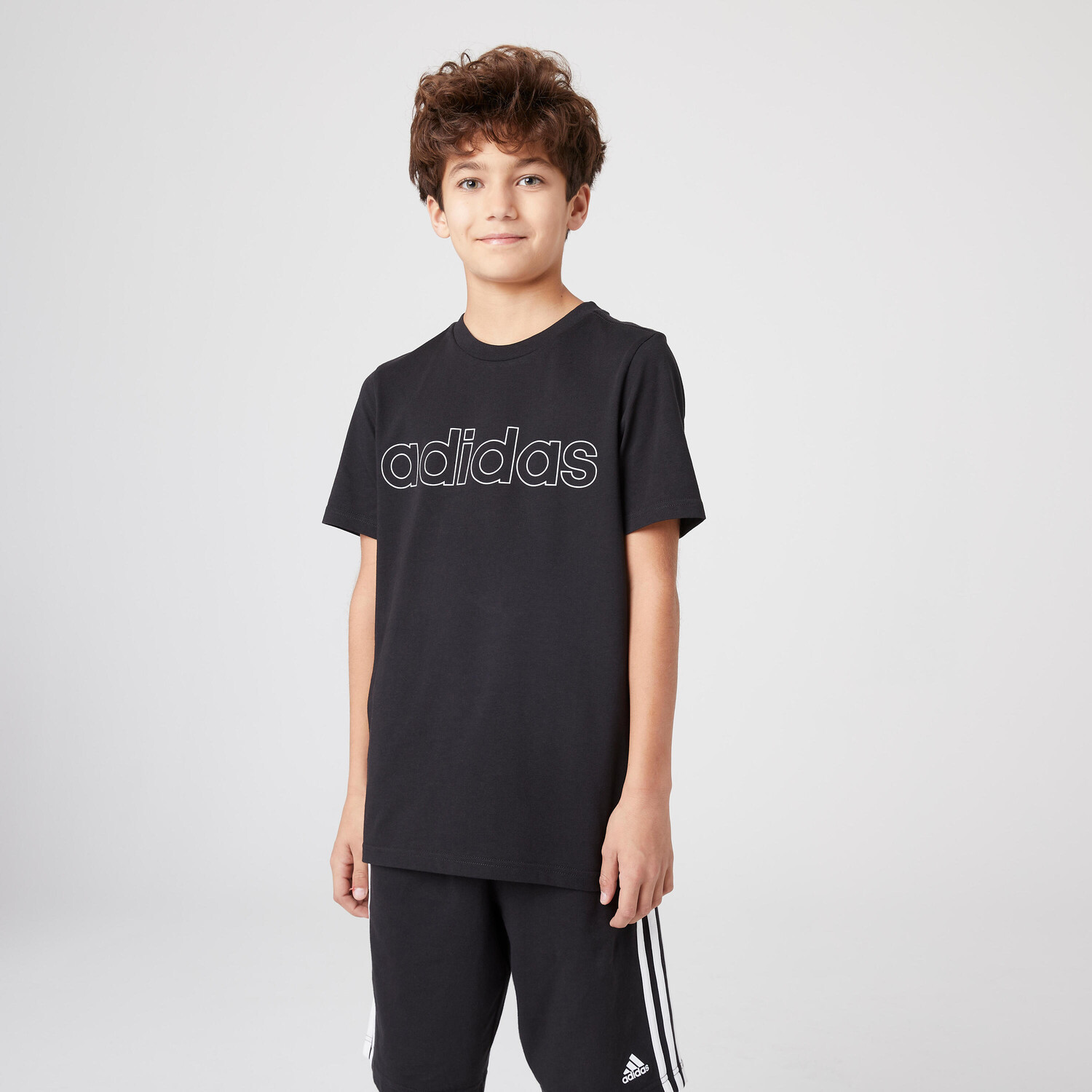 

Линейная детская черная футболка ADIDAS, черный